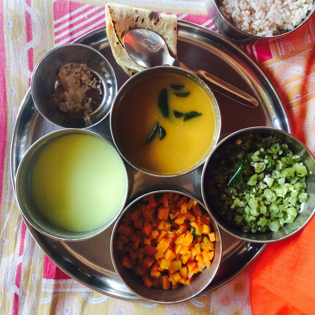 A typical non-treatment day lunch: from bottom centre, clockwise: carrots in curry leaf, buttermilk, salt (I got special salt privleges), chapati, mung bean stew, red rice and beans in coconut.